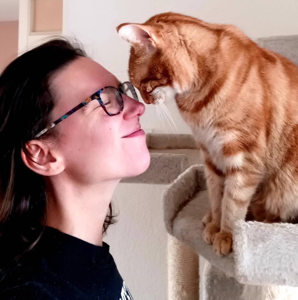 Pascal met diens kat David.